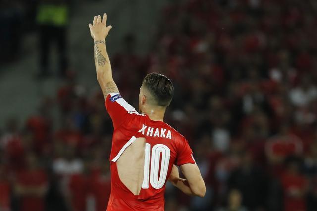 Xherdan Shaqiri after four Switzerland players, including teammate Granit Xhaka, above, ripped shirts during the 0-0 draw with France. (REUTERS)