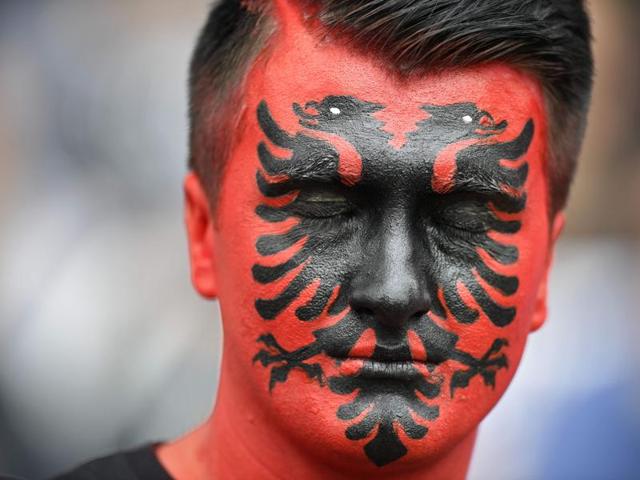 An Albania supporter closes his eyes as he waits for the start of the Euro 2016 group A football match between Albania and Switzerland at the Bollaert-Delelis Stadium in Lens on June 11, 2016. (AFP PHOTO) An Albania supporter closes his eyes as he waits for the start of the Euro 2016 group A football match between Albania and Switzerland at the Bollaert-Delelis Stadium in Lens on June 11, 2016. (AFP PHOTO)