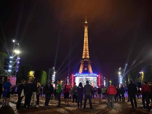 Football supporters watch the Euro 2016 group B football match between Slovakia and England at Paris' fan zone near the Eiffel tower. (AFP Photo) Football supporters watch the Euro 2016 group B football match between Slovakia and England at Paris' fan zone near the Eiffel tower. (AFP Photo)