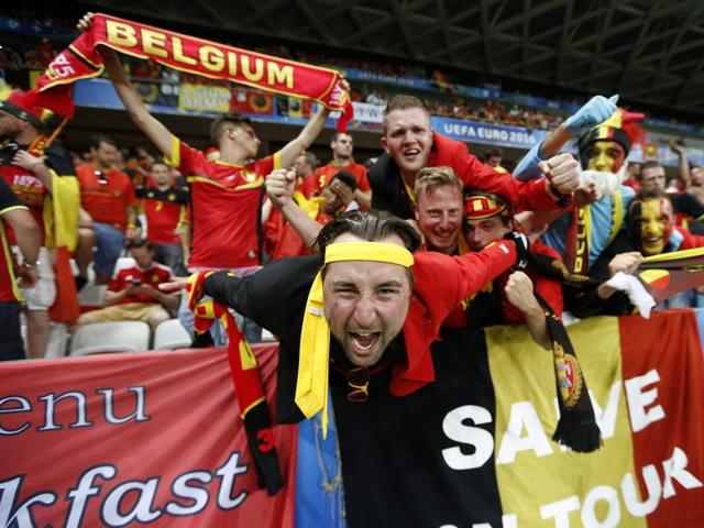 Belgium fans celebrate their 1-0 win over Sweden in the Euro 2016 group E match at the Allianz Riviera stadium in Nice. (AFP Photo) Belgium fans celebrate their 1-0 win over Sweden in the Euro 2016 group E match at the Allianz Riviera stadium in Nice. (AFP Photo)