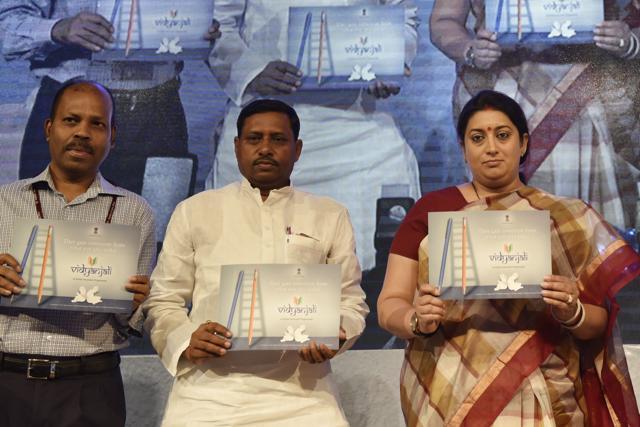 Human Resource and Development (HRD) minister Smriti Irani and Minister of State (HRD) Ramshankar Katheria at the launch of Vidyanjali, a school volunteer programme, in New Delhi. Katheria had said that there is no problem with saffronisation of education if it is for the nation’s benefit. (Saumya Khandelwal/HT Photo) Human Resource and Development (HRD) minister Smriti Irani and Minister of State (HRD) Ramshankar Katheria at the launch of Vidyanjali, a school volunteer programme, in New Delhi. Katheria had said that there is no problem with saffronisation of education if it is for the nation’s benefit. (Saumya Khandelwal/HT Photo)