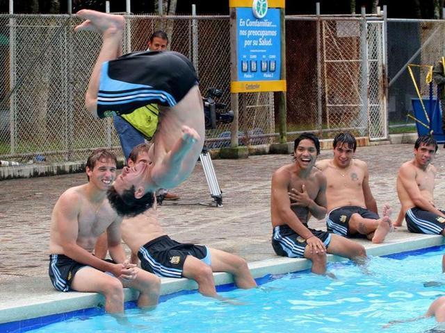 Lionel Messi flips into a pool during a relaxed practice of Argentina’s Under-20 soccer team on Jan. 14, 2005 in Pereira, Colombia. (AP Photo) Lionel Messi flips into a pool during a relaxed practice of Argentina’s Under-20 soccer team on Jan. 14, 2005 in Pereira, Colombia. (AP Photo)