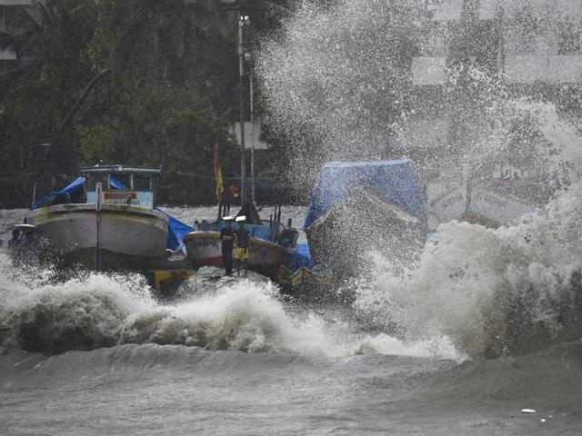Waves hit the shore during a high tide at Colaba in Mumbai on Friday. (Arijit Sen)
