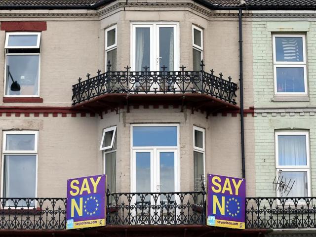A Vote Leave sign is pictured alongside a hand-written note that reads " Vote Leave - If You Do Not The Rest Of The EU Are Coming Here" outside a house in Redcar, northeast England, on Monday. Britons voted by 52% to 48% in favour of leaving the European Union in a June 23 vote that exposed deep divisions in the country. (AFP) A Vote Leave sign is pictured alongside a hand-written note that reads " Vote Leave - If You Do Not The Rest Of The EU Are Coming Here" outside a house in Redcar, northeast England, on Monday. Britons voted by 52% to 48% in favour of leaving the European Union in a June 23 vote that exposed deep divisions in the country. (AFP)