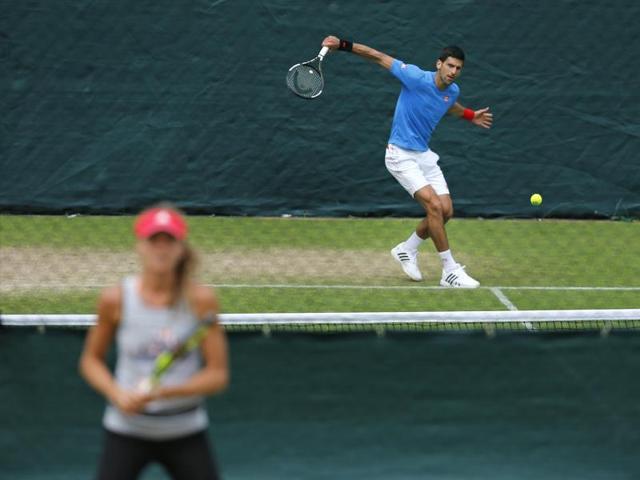 Novak Djokovic of Serbia returns the ball during a training session. (AP) Novak Djokovic of Serbia returns the ball during a training session. (AP)