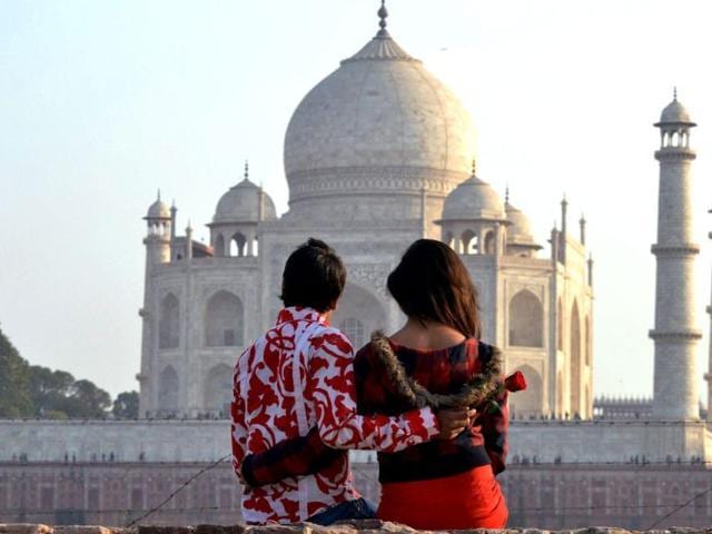 A couple near the historic Taj Mahal on the eve of Valentine's Day in Agra. (PTI) A couple near the historic Taj Mahal on the eve of Valentine's Day in Agra. (PTI)