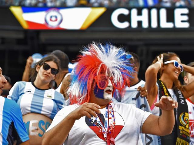 A supporter of Chile waits for the start of the Copa America Centenario final between Argentina and Chile. (AFP)