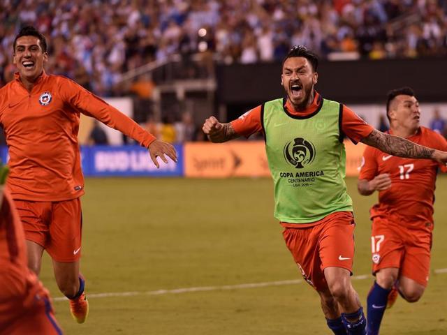 Chile's players celebrate their win. (AFP)