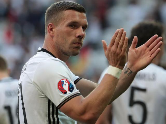 Germany's forward Lukas Podolski celebrates at the end of the Euro 2016. (AFP Photo)
