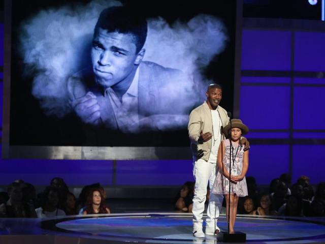 During the awards, Hollywood actor Jamie Foxx, with his daughter Annalise, reflected on the passing of both Prince and Muhammad Ali. Regarding Ali, Foxx remembered the icon as someone who “stood up at at time when no one was standing up. It’s definitely more than just boxing, more than just entertainment, but someone who shaped all our lives.” (AP)