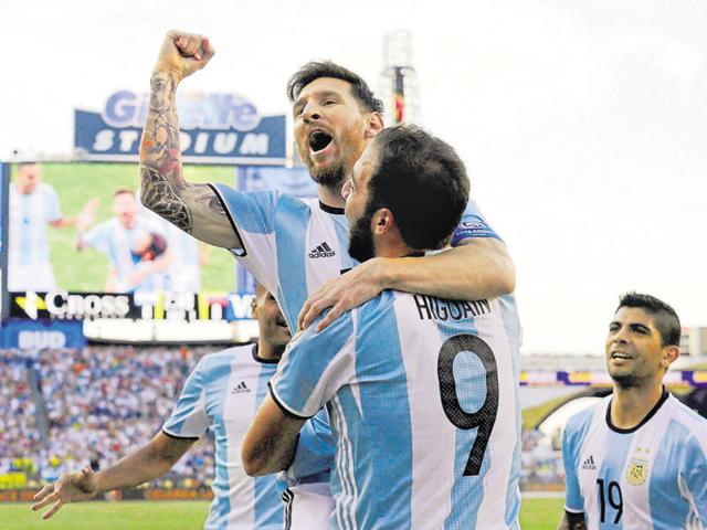 Argentina's Lionel Messi, top, celebrates a goal by Gonzalo Higuain (9) during the first half of a Copa America Centenario quarterfinal. (AP Photo) Argentina's Lionel Messi, top, celebrates a goal by Gonzalo Higuain (9) during the first half of a Copa America Centenario quarterfinal. (AP Photo)