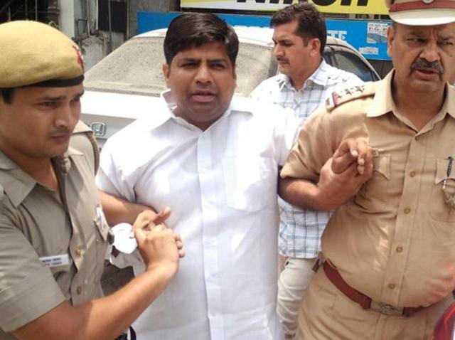 Aam Aadmi Party MLA Dinesh Mohaniya after his arrest on Saturday.
