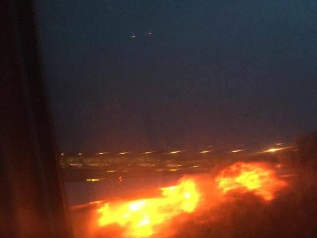 This image provided by Lee Bee Yee shows an engine on fire on a Singapore Airlines flight on Monday, June 27, 2016. A Singapore Airlines statement said the Boeing 777-300ER was on its way to Milan when it turned back "following an engine oil warning message. (AP Photo) This image provided by Lee Bee Yee shows an engine on fire on a Singapore Airlines flight on Monday, June 27, 2016. A Singapore Airlines statement said the Boeing 777-300ER was on its way to Milan when it turned back "following an engine oil warning message. (AP Photo)