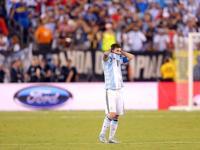 A disappointed Messi after missing his penalty. (ReutersUSA Today Sports)