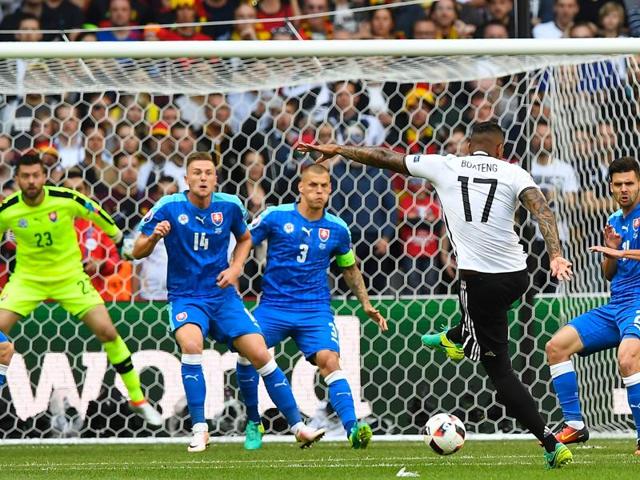 Germany's defender Jerome Boateng kicks the ball to score a goal. (AFP photo)