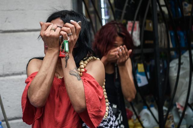 People stand in the street as Turkish anti riot police officers fired rubber bullets and tear gas. (AFP) People stand in the street as Turkish anti riot police officers fired rubber bullets and tear gas. (AFP)