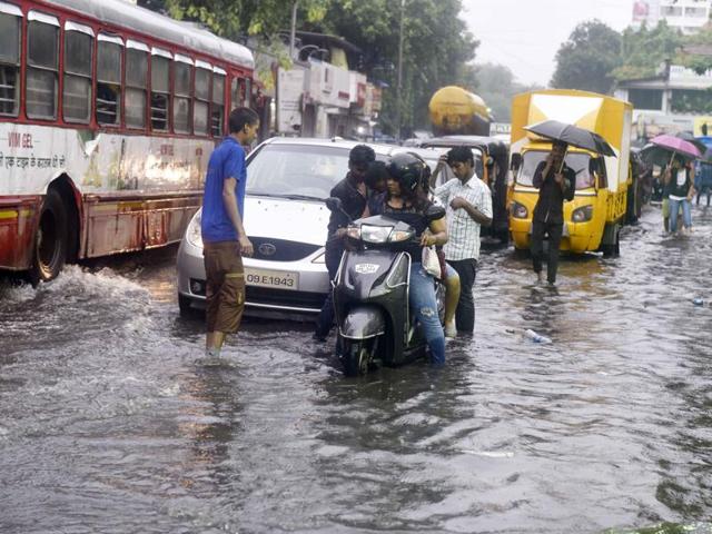 Traffic snarl is a fallout of heavy rain. This, however, doesn’t stop residents from stepping out of home. (Vidya Subramanian)