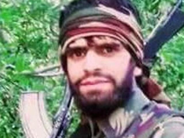 A month after the confusion over the arrest of Hizb militant Tariq Pandit (in pic), the poster in Urdu said that the militant had surrendered and was involved in the killing of two commanders, Naseer Pandit and Waseem Malla.(HT Photo) A month after the confusion over the arrest of Hizb militant Tariq Pandit (in pic), the poster in Urdu said that the militant had surrendered and was involved in the killing of two commanders, Naseer Pandit and Waseem Malla.(HT Photo)