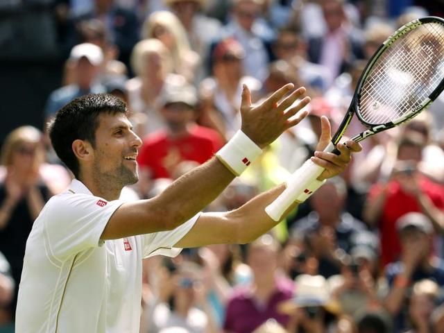 Novak Djokovic of Serbia celebrates after beating James Ward of Britain. (AP) Novak Djokovic of Serbia celebrates after beating James Ward of Britain. (AP)