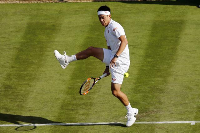 Kei Nishikori of Japan plays a return during his 6-4, 6-3, 7-5 win over Sam Groth of Australia. (AP) Kei Nishikori of Japan plays a return during his 6-4, 6-3, 7-5 win over Sam Groth of Australia. (AP)