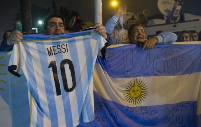 Fans showed their support for Messi on the team’s return to Argentina. (AP)