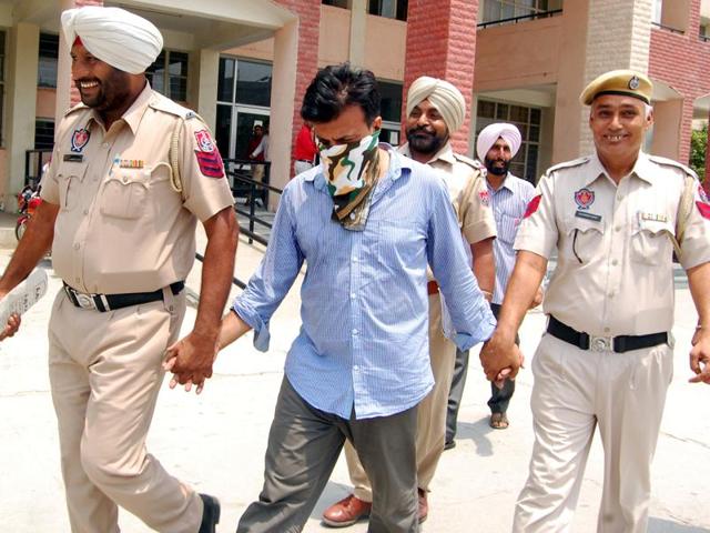 The accused Zahir Vohra being produced in a court in Bathinda on Monday.(Sanjeev Kumar/HT Photo)