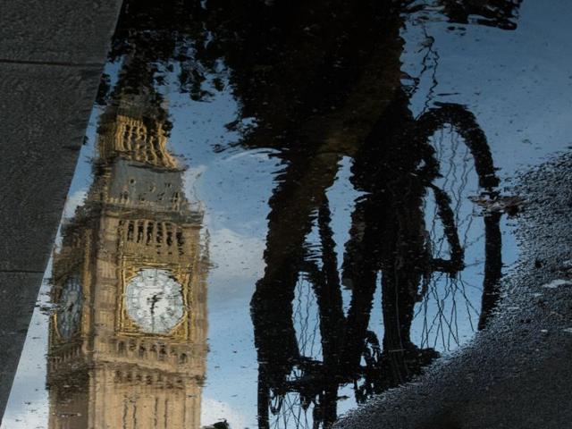 The Big Ben is reflected in a puddle as a cyclist rides by in London on Monday. The UK accounts for 15% of India’s total merchandise trade, but its share has been declining. (AFP) The Big Ben is reflected in a puddle as a cyclist rides by in London on Monday. The UK accounts for 15% of India’s total merchandise trade, but its share has been declining. (AFP)