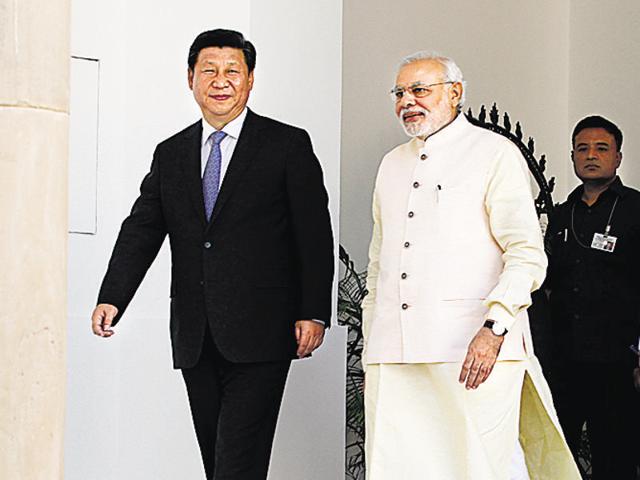 File photo of Chinese President Xi Jinping and Indian Prime Minister Narendra Modi at the Hyderabad House in New Delhi in 2014. Beijing today said it will be in dialogue with New Delhi to find a “fair, sensible and mutually acceptable solution” to the contentious issues. (Arvind Yadav/ Hindustan Times) File photo of Chinese President Xi Jinping and Indian Prime Minister Narendra Modi at the Hyderabad House in New Delhi in 2014. Beijing today said it will be in dialogue with New Delhi to find a “fair, sensible and mutually acceptable solution” to the contentious issues. (Arvind Yadav/ Hindustan Times)