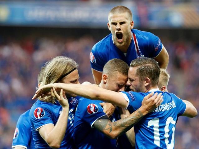 Iceland's Ragnar Sigurdsson celebrates scoring their first goal . (REUTERS PHOTO)