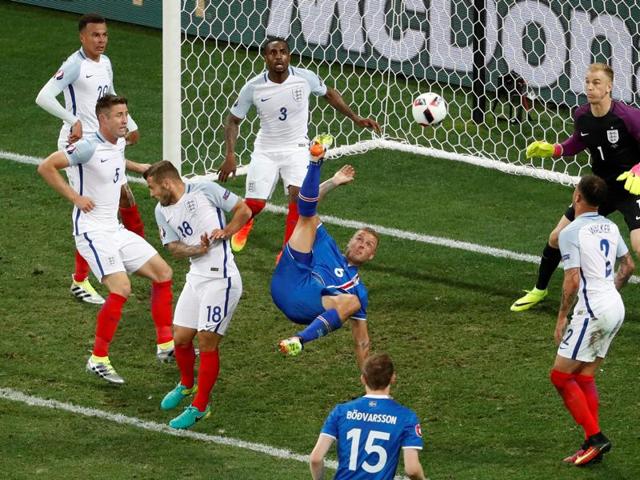 Iceland's Ragnar Sigurdsson attempts an overhead kick. (REUTERS PHOTO)