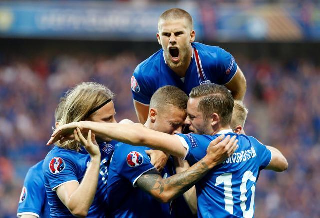 Iceland's Ragnar Sigurdsson celebrates scoring after scoring the equaliser against England. The smallest team in the competition toppled England to reach the quarterfinals. (REUTERS) Iceland's Ragnar Sigurdsson celebrates scoring after scoring the equaliser against England. The smallest team in the competition toppled England to reach the quarterfinals. (REUTERS)