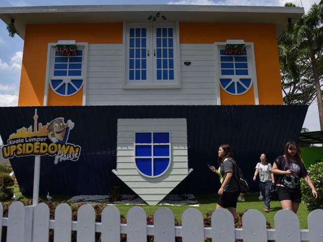 It is a two-storey house and is the latest attraction for tourists arriving to the Malaysian capital . (AFP) It is a two-storey house and is the latest attraction for tourists arriving to the Malaysian capital . (AFP)