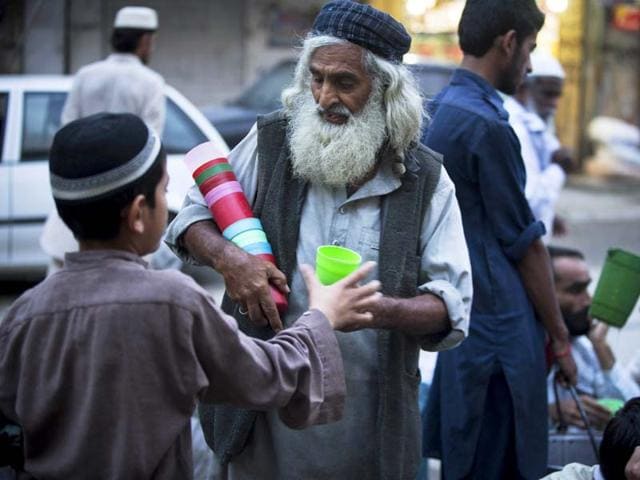 A Hindu journalist in Pakistan has alleged that hebeen barred from drinking water in the same glass and sharing utensils with other Muslim staff at the office after his colleagues found out his religion. (AP File Photo) A Hindu journalist in Pakistan has alleged that hebeen barred from drinking water in the same glass and sharing utensils with other Muslim staff at the office after his colleagues found out his religion. (AP File Photo)