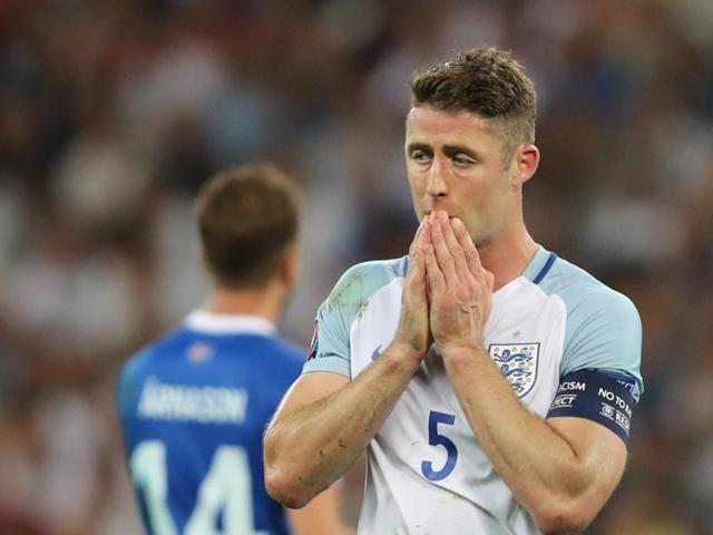 England's dejected Gary Cahill reacts during the match (AP PHOTO)