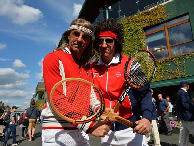 Spectators dressed to resemble former champions Bjorn Borg (L) and John McEnroe (R) pose for a photograph. (AFP) Spectators dressed to resemble former champions Bjorn Borg (L) and John McEnroe (R) pose for a photograph. (AFP)