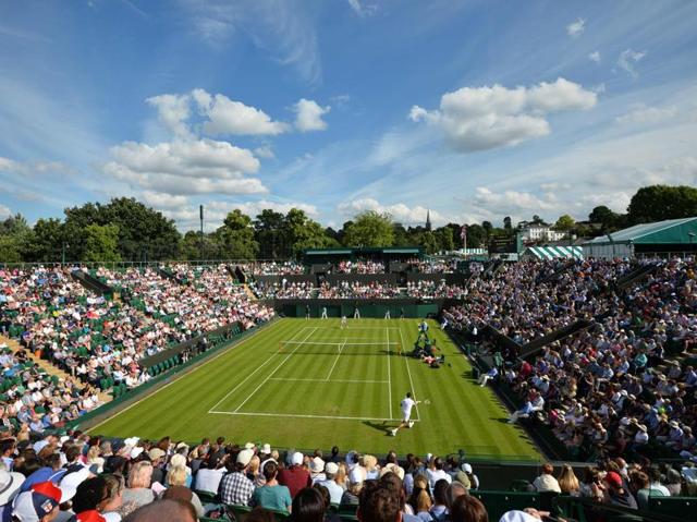 Perfect weather for tennis as Milos Raonic (near) and Pablo Carreno Busta battle it out on the No 2 Court. (AFP) Perfect weather for tennis as Milos Raonic (near) and Pablo Carreno Busta battle it out on the No 2 Court. (AFP)