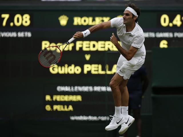 Switzerland's Roger Federer serves during his 7-6 (5), 7-6 (3), 6-3 win over Argentina's Guido Pella in the first round. (AFP) Switzerland's Roger Federer serves during his 7-6 (5), 7-6 (3), 6-3 win over Argentina's Guido Pella in the first round. (AFP)