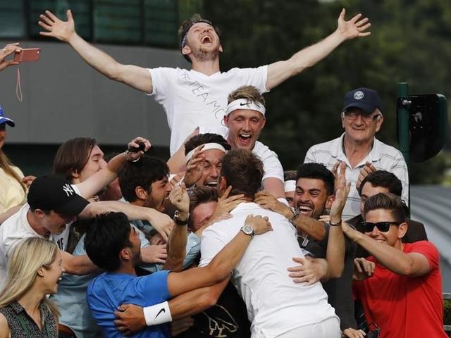 Great Britain's Marcus Willis celebrates with friends after winning his first-round match against Lithuania's Ricardas Berankis on Day 1 of Wimbledon at the All England Club in London, on June 27, 2016. (Reuters) Great Britain's Marcus Willis celebrates with friends after winning his first-round match against Lithuania's Ricardas Berankis on Day 1 of Wimbledon at the All England Club in London, on June 27, 2016. (Reuters)