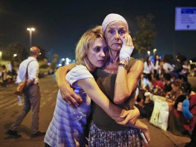 Passengers embrace each other as they wait outside Istanbul’s Ataturk airport, early Wednesday, June 29, 2016 following their evacuation after a blast. (AP Photo) Passengers embrace each other as they wait outside Istanbul’s Ataturk airport, early Wednesday, June 29, 2016 following their evacuation after a blast. (AP Photo)