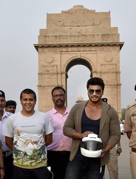 Arjun Kapoor and author Chetan Bhagat during an awareness campaign for road safety organised by Delhi Traffic Police at India Gate in New Delhi on Tuesday. (PTI) Arjun Kapoor and author Chetan Bhagat during an awareness campaign for road safety organised by Delhi Traffic Police at India Gate in New Delhi on Tuesday. (PTI)