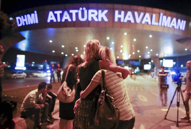Passengers embrace each other at the entrance to Istanbul's Ataturk airport, early Wednesday, June 29, 2016 following their evacuation after the blast. (AP Photo) Passengers embrace each other at the entrance to Istanbul's Ataturk airport, early Wednesday, June 29, 2016 following their evacuation after the blast. (AP Photo)