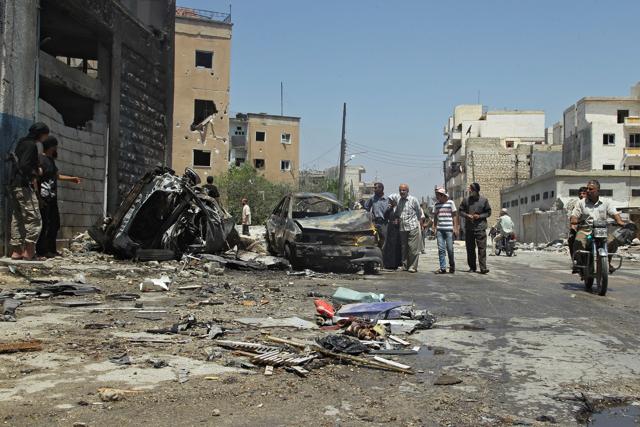 Civilians inspect a site hit by an airstrike in the rebel-controlled city of Idlib, Syria. (REUTERS) Civilians inspect a site hit by an airstrike in the rebel-controlled city of Idlib, Syria. (REUTERS)