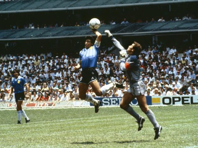 Diego Maradona scores his ‘Hand of God’ goal past England goalkeeper Peter Shilton in the 1986 World Cup quarterfinal on June 22, 1986. (Getty Images) Diego Maradona scores his ‘Hand of God’ goal past England goalkeeper Peter Shilton in the 1986 World Cup quarterfinal on June 22, 1986. (Getty Images)