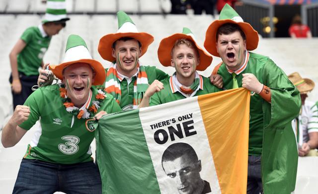 Ireland's fans hold an Irish flag before the Euro 2016 group E football match between Ireland and Sweden at the Stade de France stadium in Saint-Denis, near Paris, on June 13, 2016. (AFP) Ireland's fans hold an Irish flag before the Euro 2016 group E football match between Ireland and Sweden at the Stade de France stadium in Saint-Denis, near Paris, on June 13, 2016. (AFP)