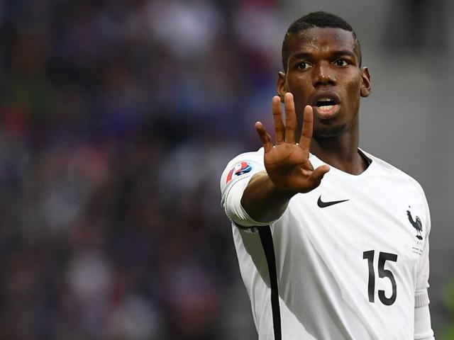 France's Paul Pogba, left, jumps for an header during the Euro 2016 round of 16 soccer match between France and Ireland. (AP) France's Paul Pogba, left, jumps for an header during the Euro 2016 round of 16 soccer match between France and Ireland. (AP)