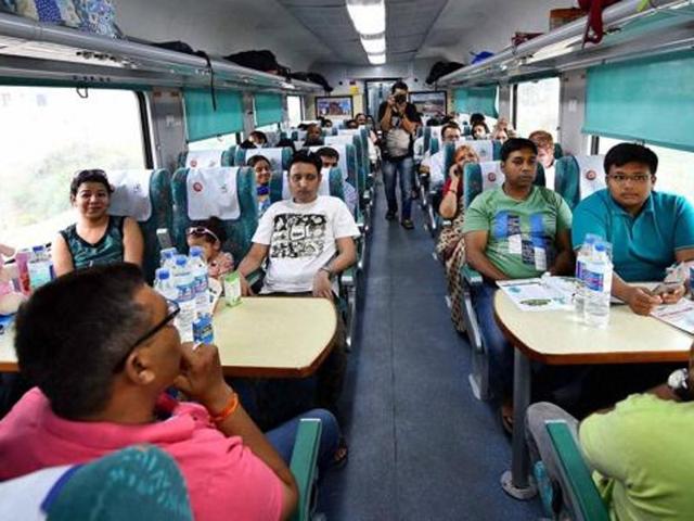 Passengers aboard the newly launched 'Gatimaan Express', India’s first semi-high speed train. (PTI Photo) Passengers aboard the newly launched 'Gatimaan Express', India’s first semi-high speed train. (PTI Photo)