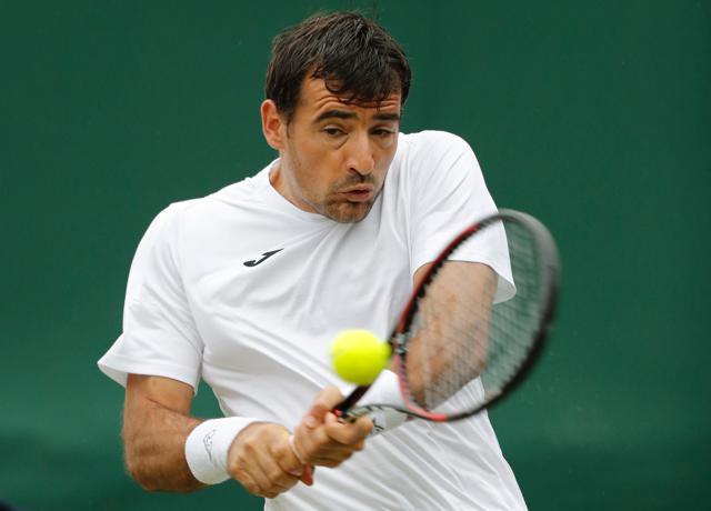 Croatia's Ivan Dodig returns to Czech Republic's Tomas Berdych during a men's singles first round match on the third day of the 2016 Wimbledon Championships at The All England Lawn Tennis Club in Wimbledon. (AFP Photo) Croatia's Ivan Dodig returns to Czech Republic's Tomas Berdych during a men's singles first round match on the third day of the 2016 Wimbledon Championships at The All England Lawn Tennis Club in Wimbledon. (AFP Photo)