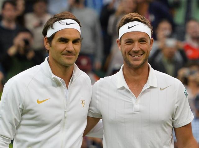 Britain's Marcus Willis (R) poses with opponent Switzerland's Roger Federer (L) at the start of their men's singles second round match. (AFP) Britain's Marcus Willis (R) poses with opponent Switzerland's Roger Federer (L) at the start of their men's singles second round match. (AFP)