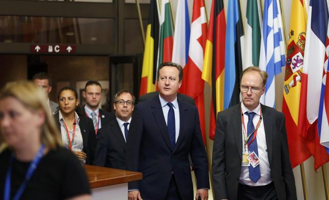 United Kingdom's Prime Minister David Cameron and his delegation leave the EU Summit in Brussels. (Reuters) United Kingdom's Prime Minister David Cameron and his delegation leave the EU Summit in Brussels. (Reuters)