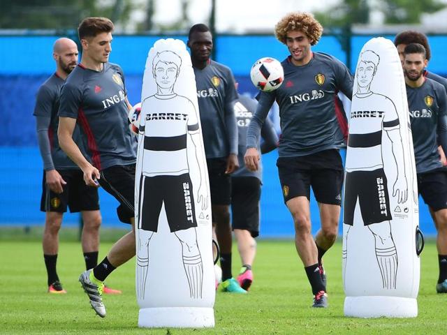Belgium soccer players take part in a training session involving airbag dummies as opposition team players. (AFP PHOTO)